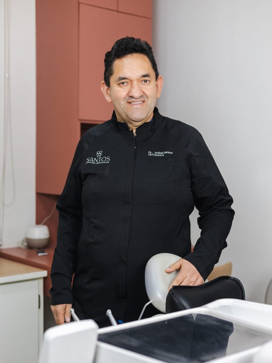 Dr. Aníbal Santos in the treatment room at Santos Dental